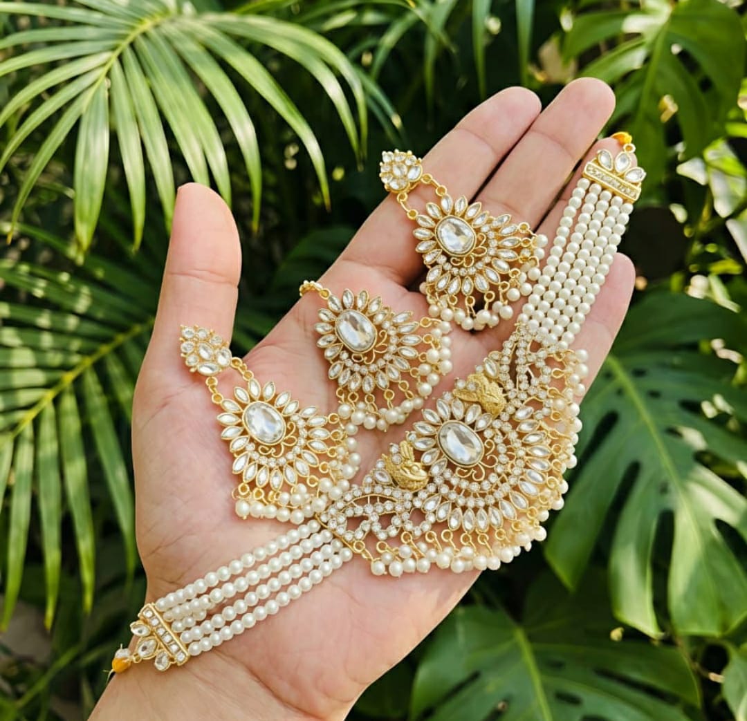 Gold-tone floral bridal necklace set with pearl strands and matching tikli
