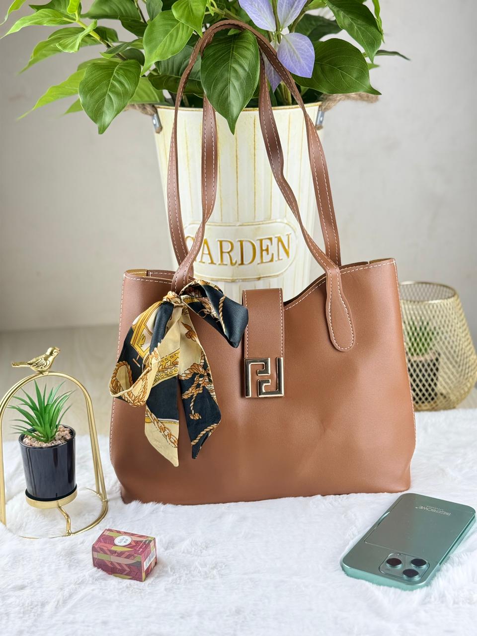Tan brown PU leather shoulder tote bag with silk scarf ribbon accent and gold buckle closure
