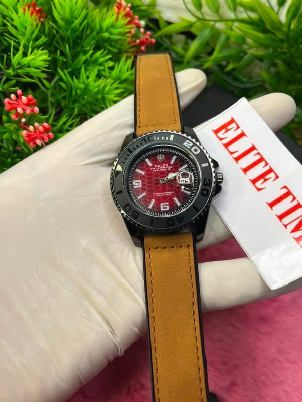 Luxury red dial men's watch with brown leather strap in presentation box — view 2